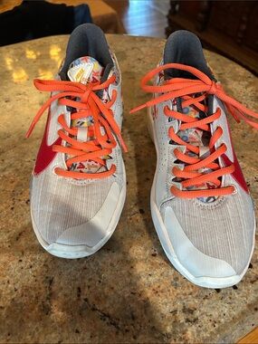 Nike Kids Sneakers in Gray with Orange and Red Accents